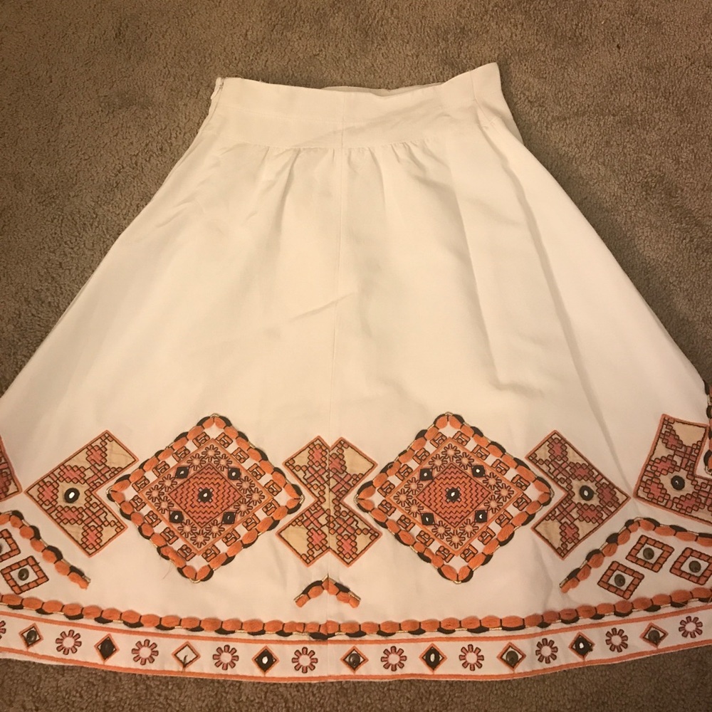 Super classy Knee length embroidered skirt.